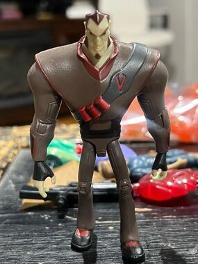 Gray and Red Action Figure Toy - Elite Warrior